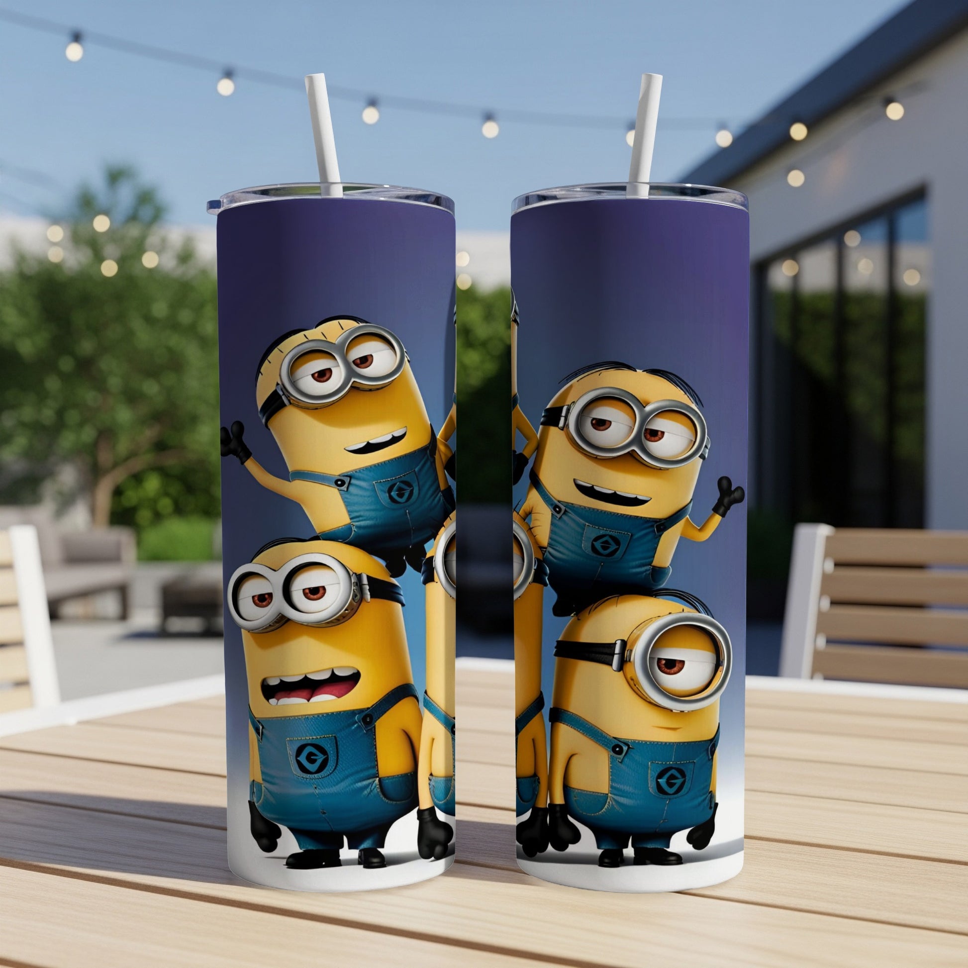Two Minion-themed tumblers with cartoon characters on a table.