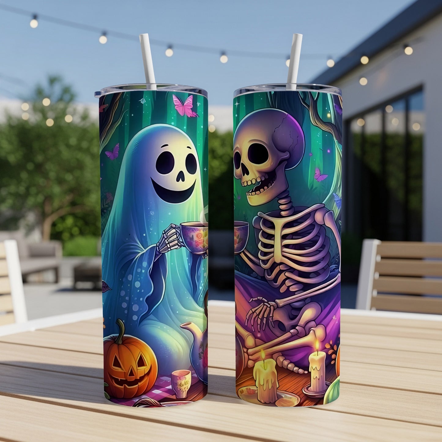 Two tumblers feature a ghost and skeleton enjoying tea, with Halloween elements.