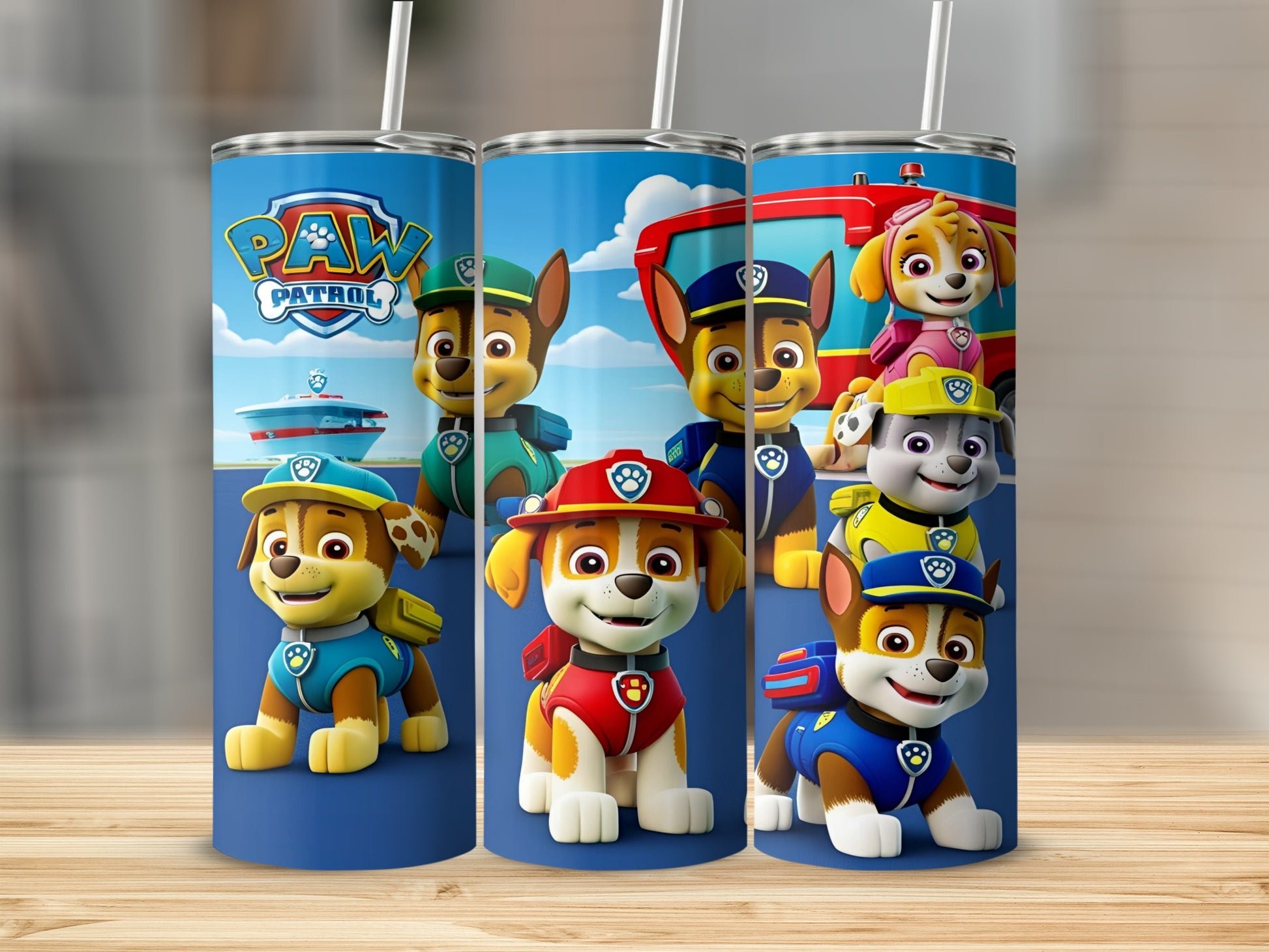 Paw Patrol characters Chase, Marshall, and Skye on blue tumblers.