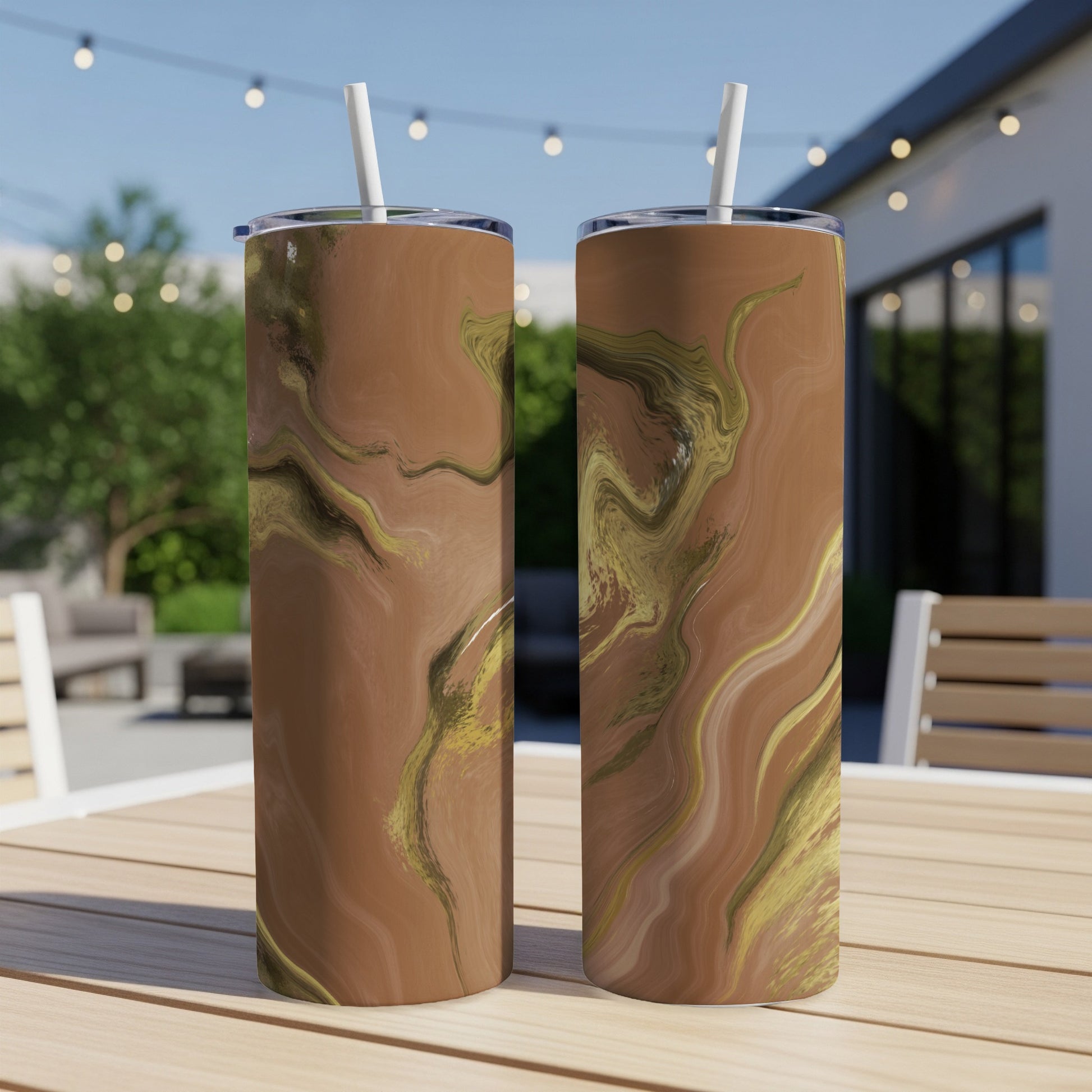 Two tall tumblers with brown and gold abstract marbling pattern.