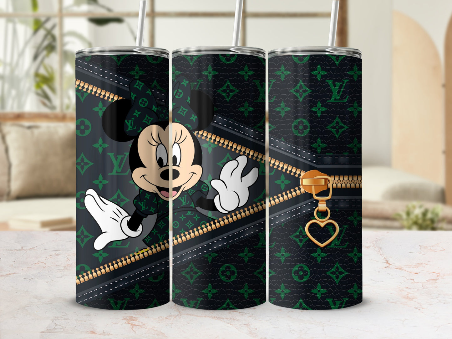 Mickey Mouse on a green and black monogrammed tumbler with gold zipper detail.