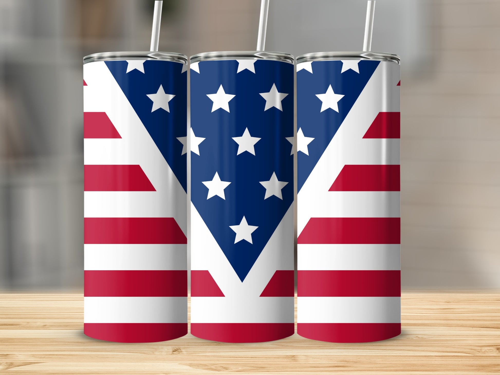 Three tumblers decorated with the American flag design.