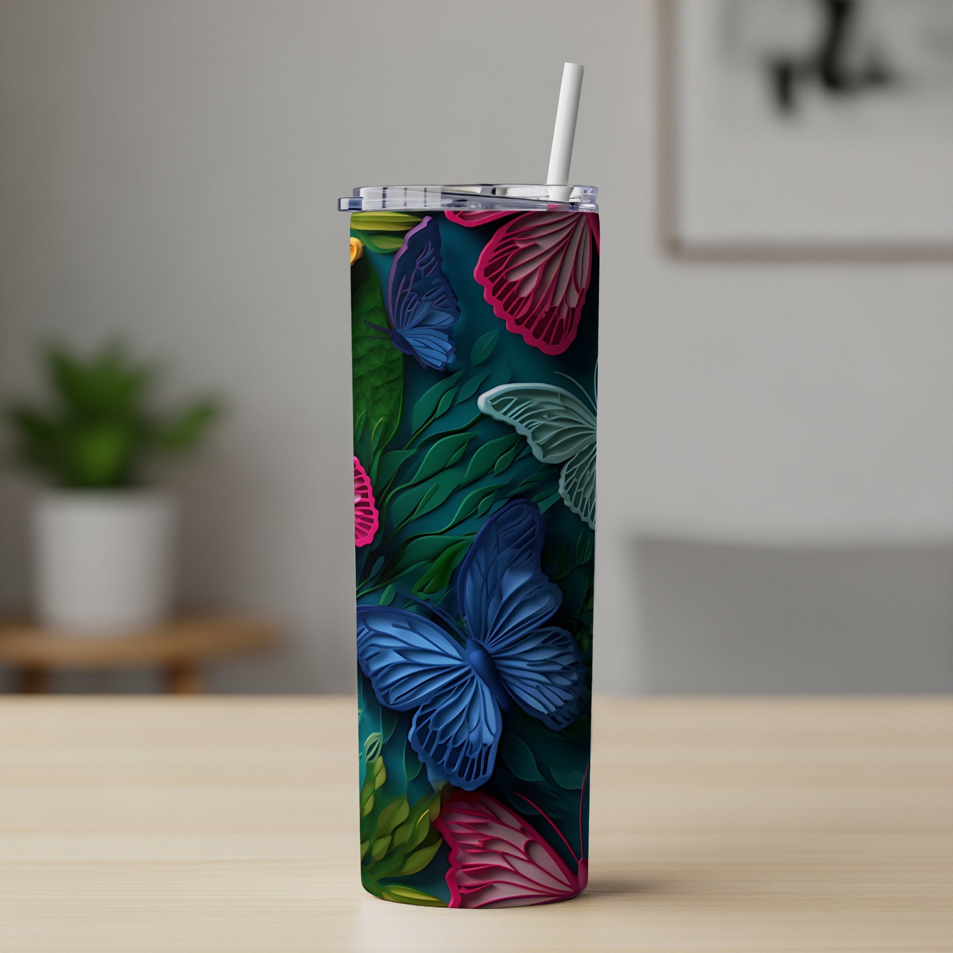Tall tumbler with colorful butterflies and green leaves design.