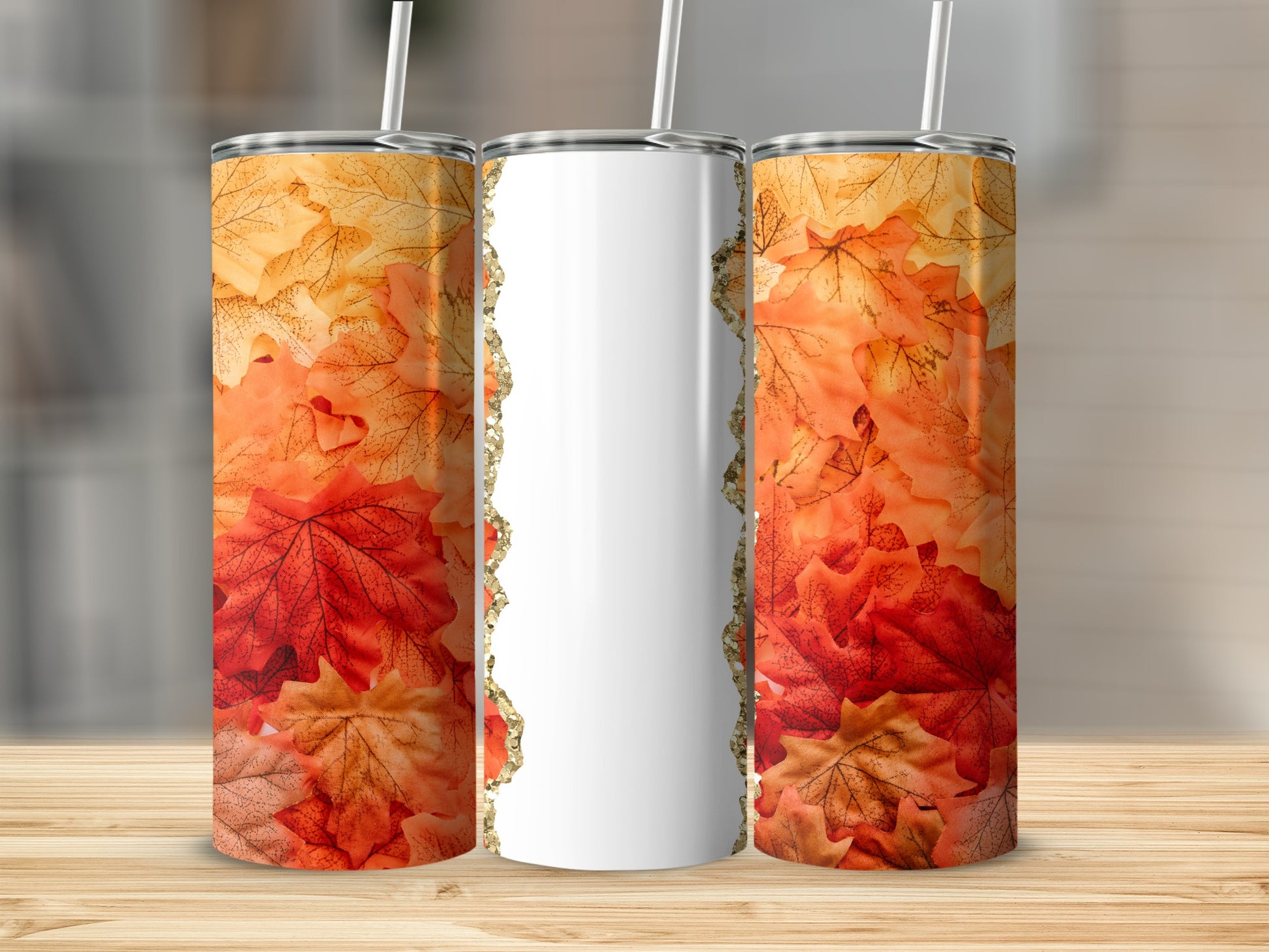 Autumn leaves design on a white tumbler with a gold glitter border.