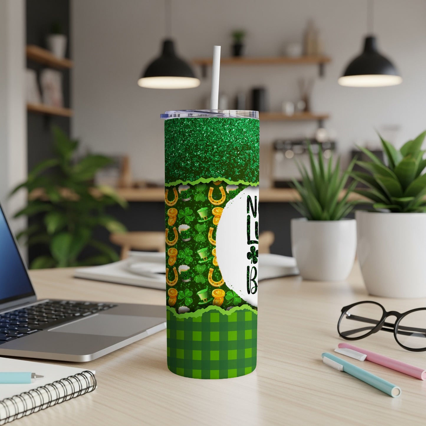 Green glitter and plaid St. Patrick's Day tumbler with shamrocks and horseshoes.