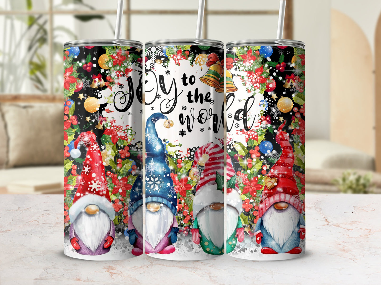 Four colorful Christmas gnomes on tumblers with "Joy to the world" text.