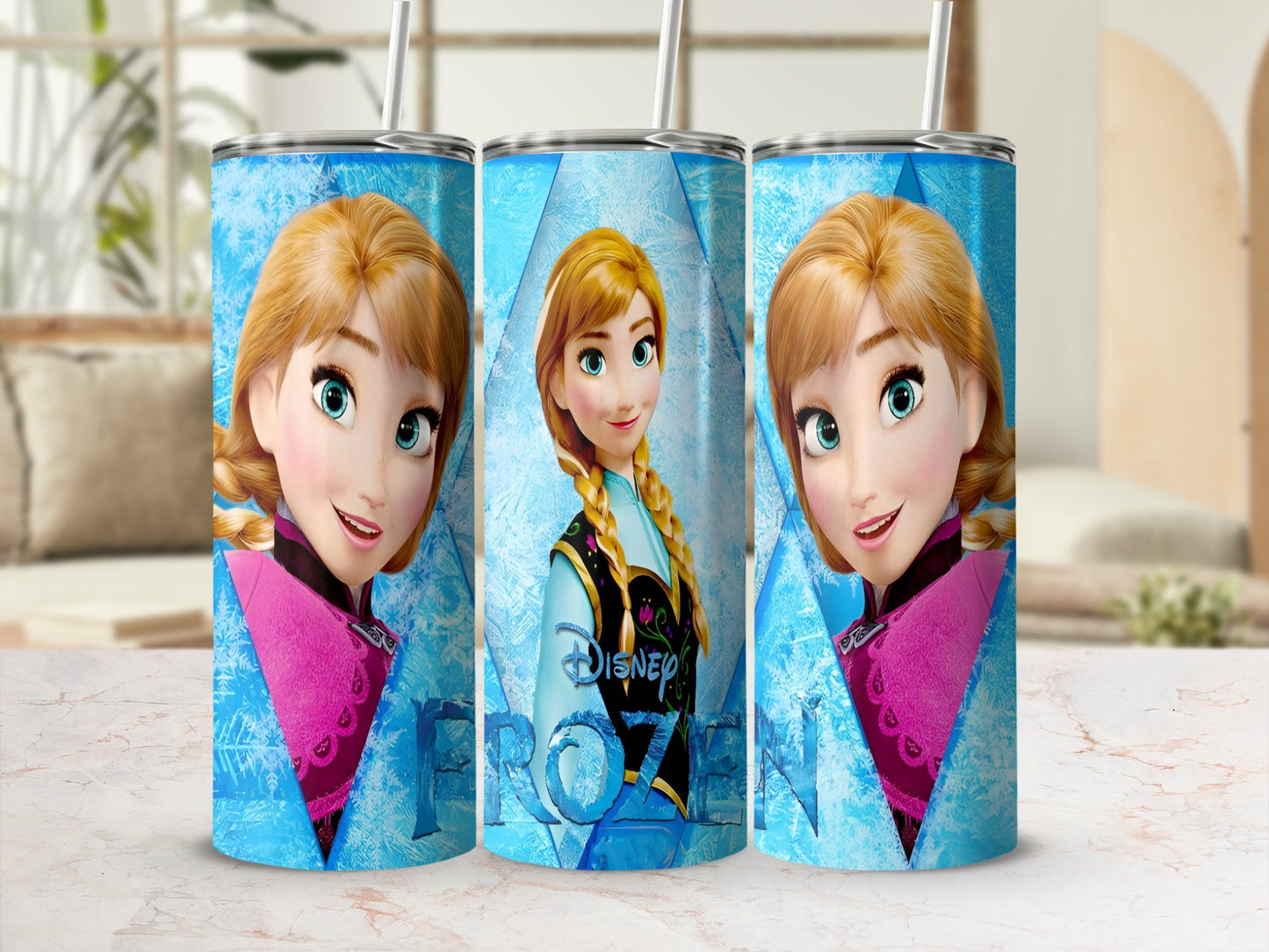 Anna from Frozen on a blue and pink tumbler with a straw.