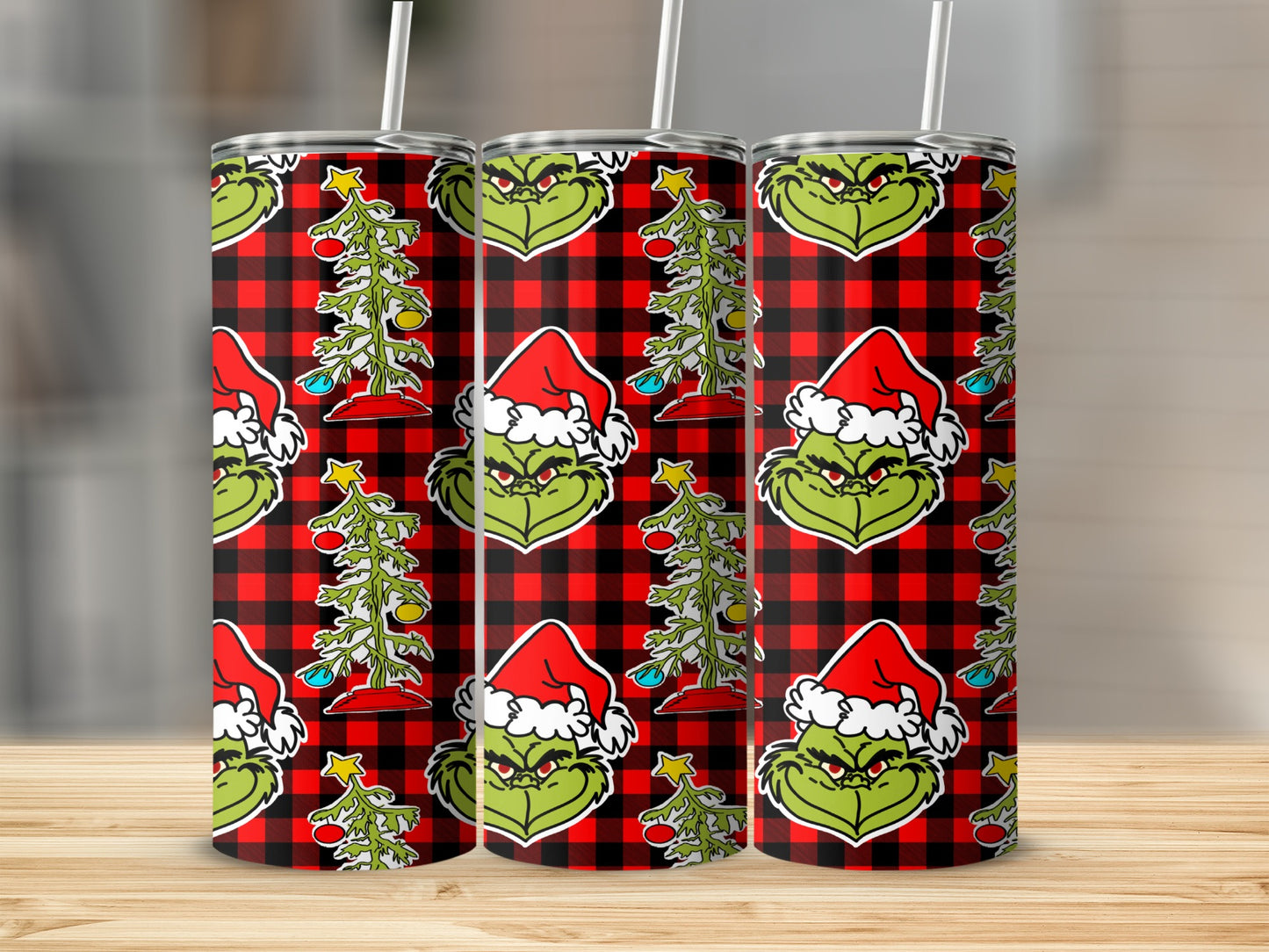 Grinch wearing Santa hat with Christmas tree on buffalo plaid background.