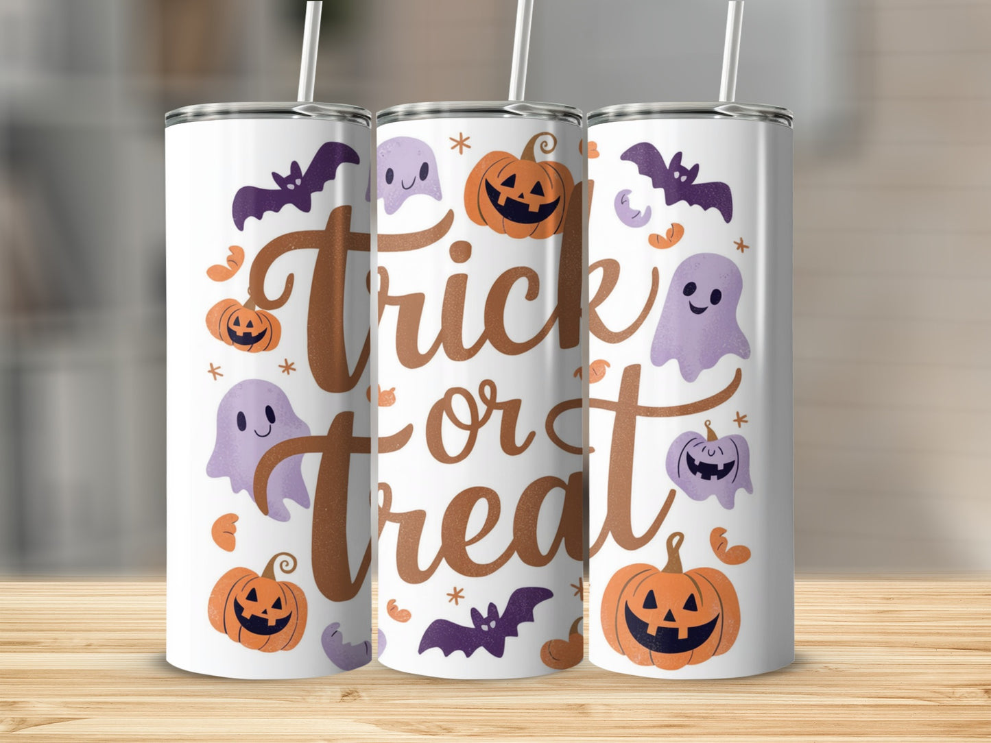 Three tumblers with a white background, featuring "Trick or Treat" text and Halloween graphics.