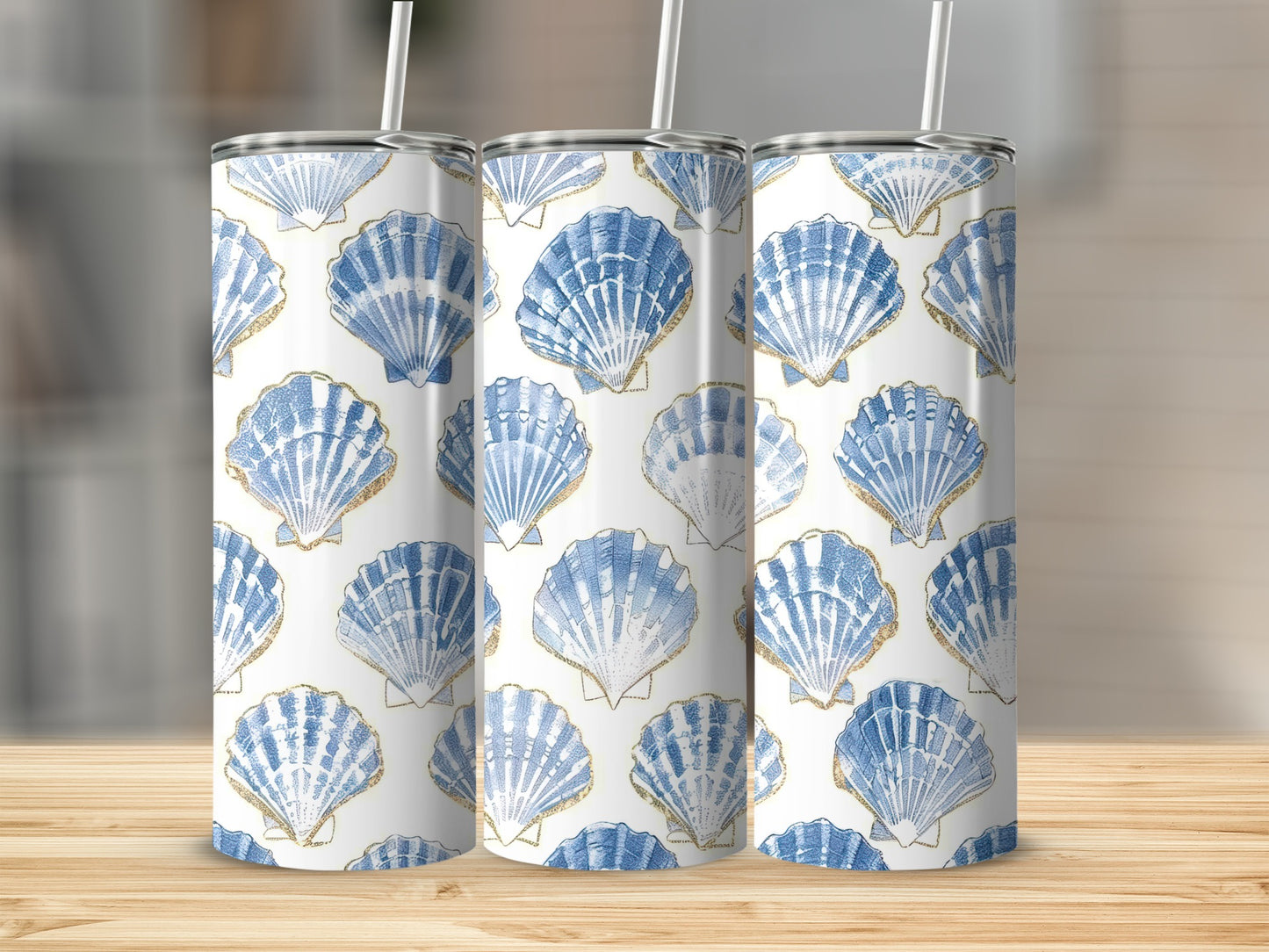 Three tumblers with a white background and blue seashell pattern.