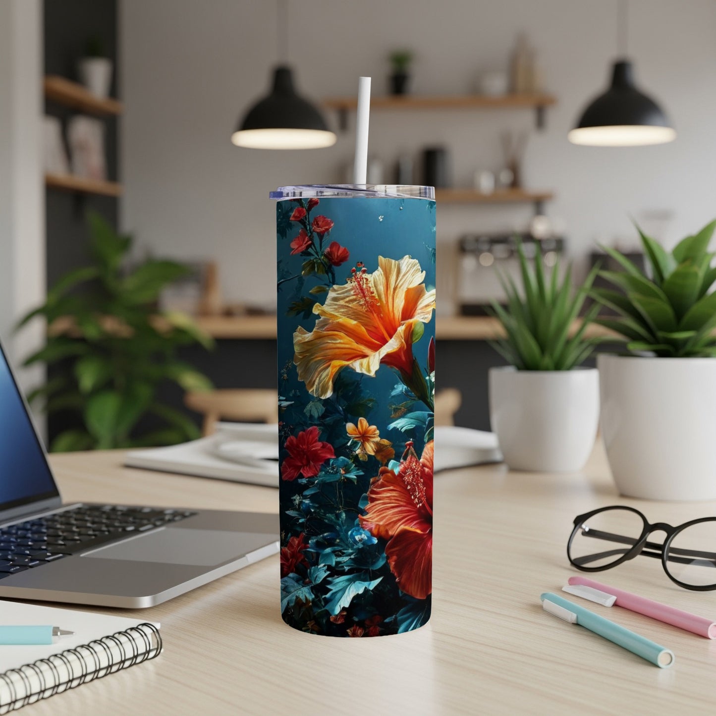 Tall tumbler with a vibrant floral pattern featuring hibiscus flowers.