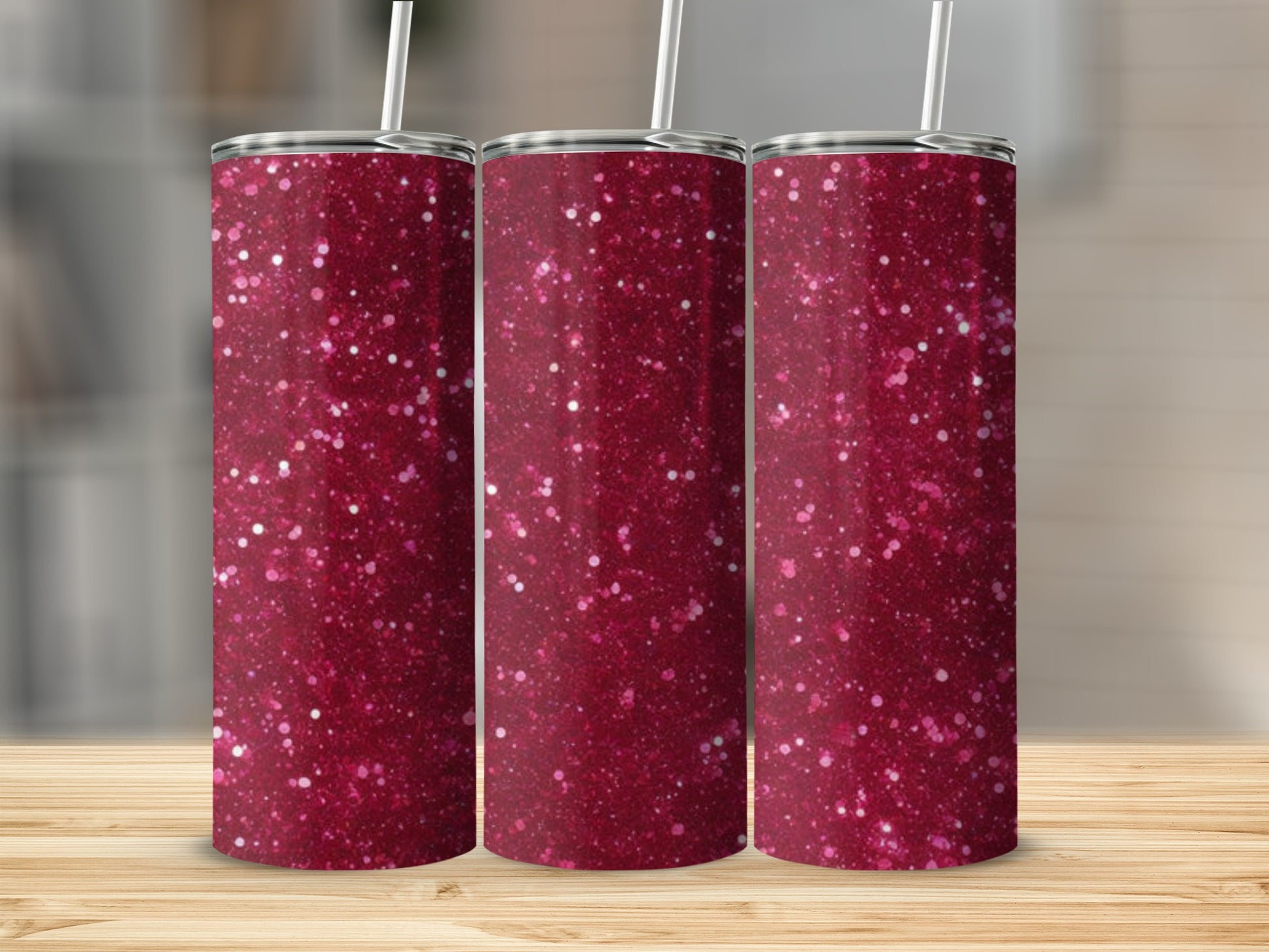 Three glitter tumblers with straws, showcasing a dark pink sparkle design.