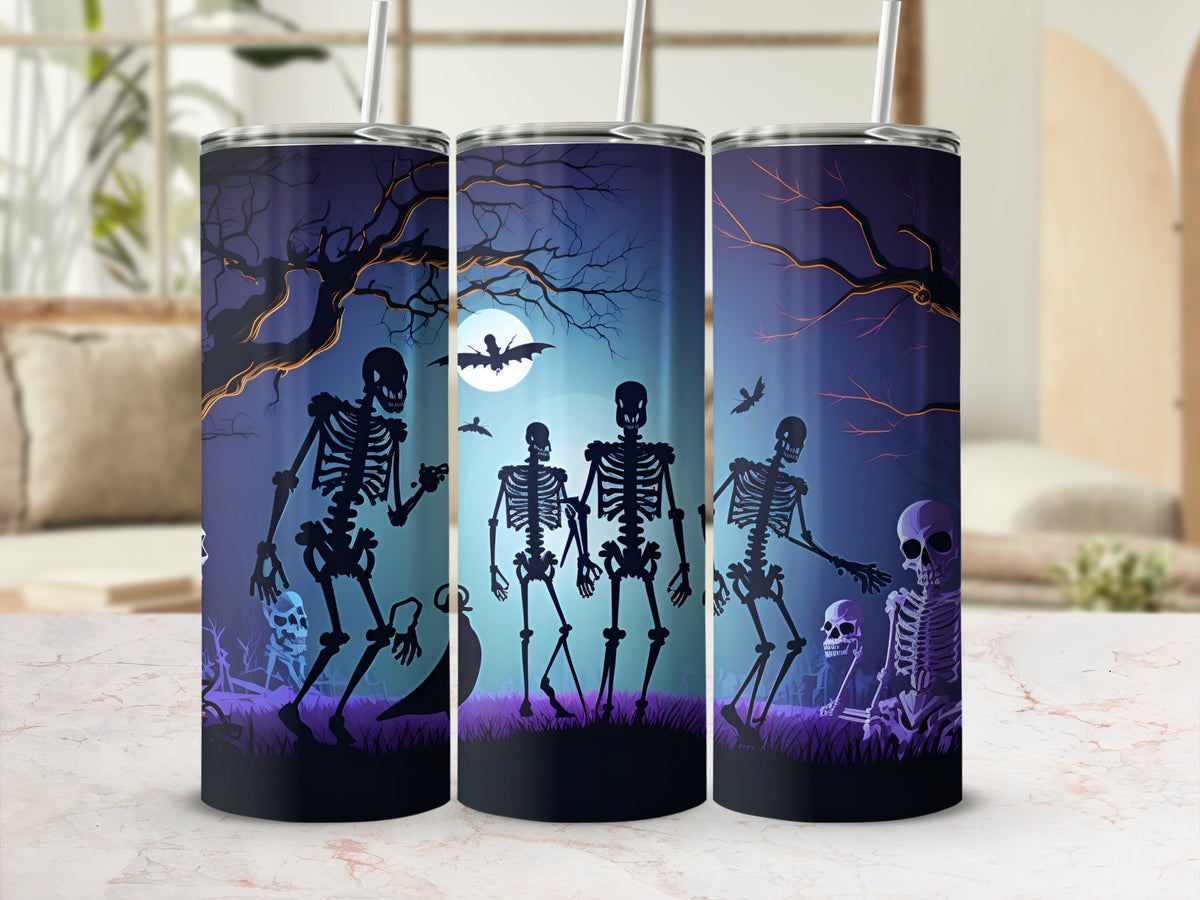 Halloween tumbler with skeletons, bats, and a moon on a purple background.