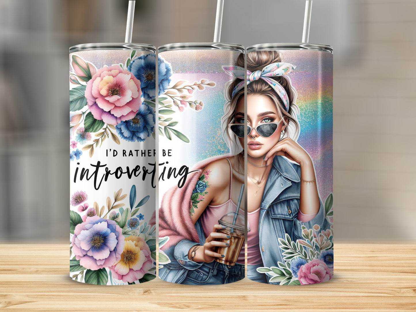 Tumbler with "I'd rather be introverting" and floral art beside a woman with sunglasses.