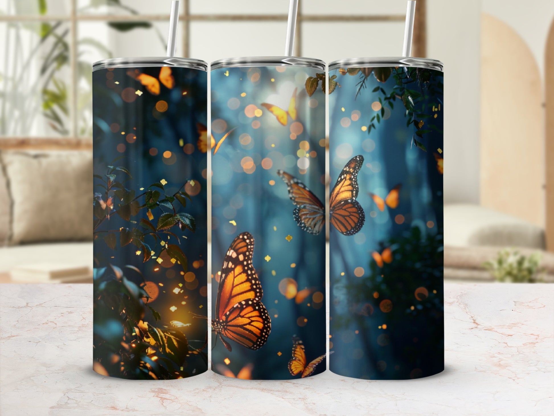 Three tumblers featuring orange butterflies and glowing lights in a forest.