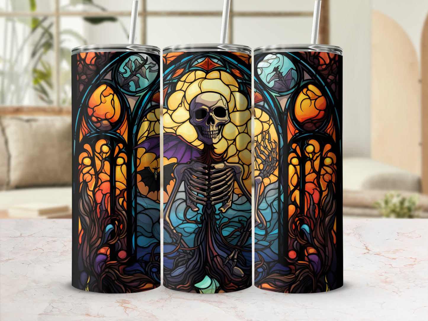 Skeleton in stained glass window design on three tumblers.