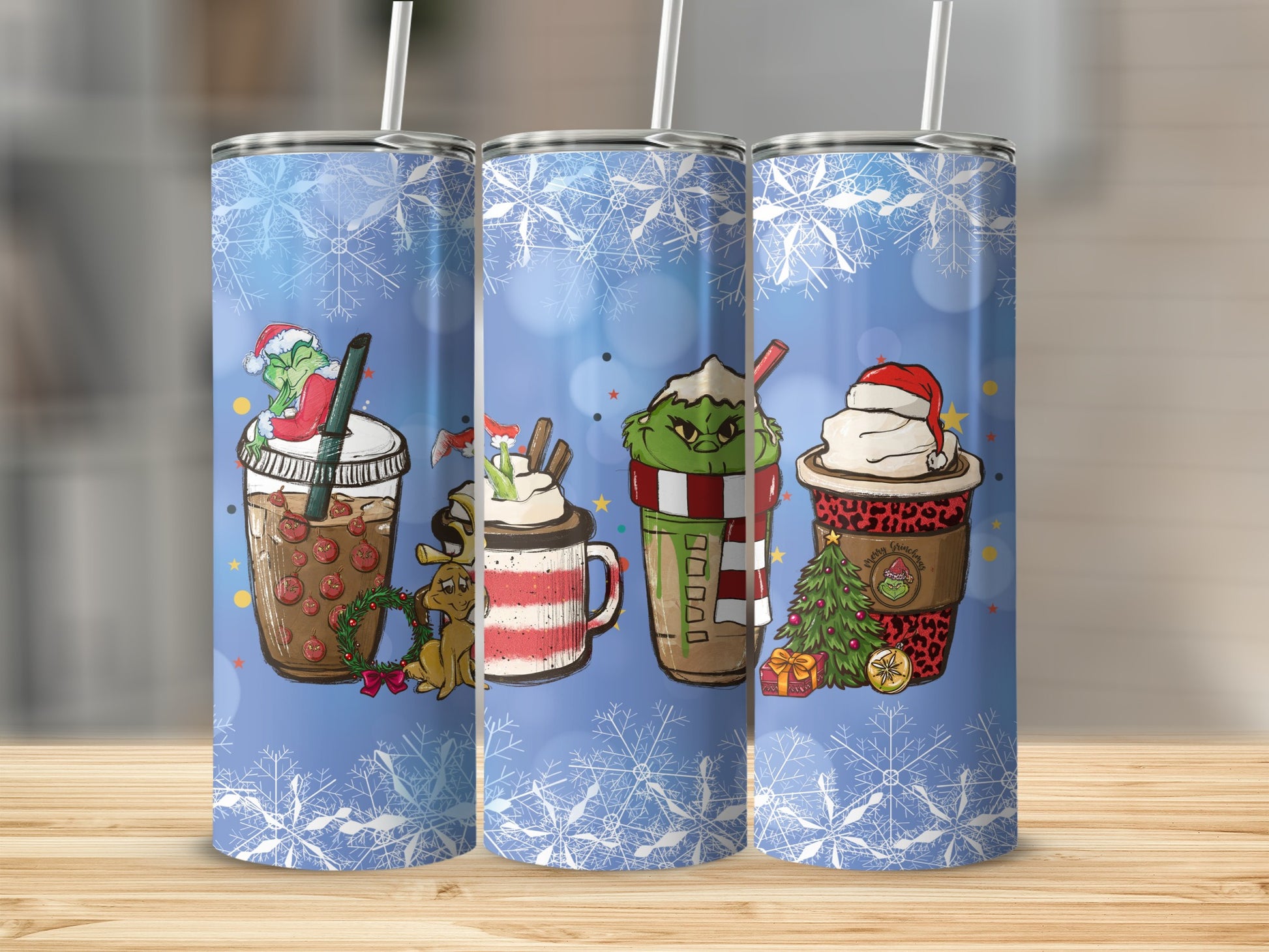 Three Grinch-themed tumblers with snowflake background and holiday designs.