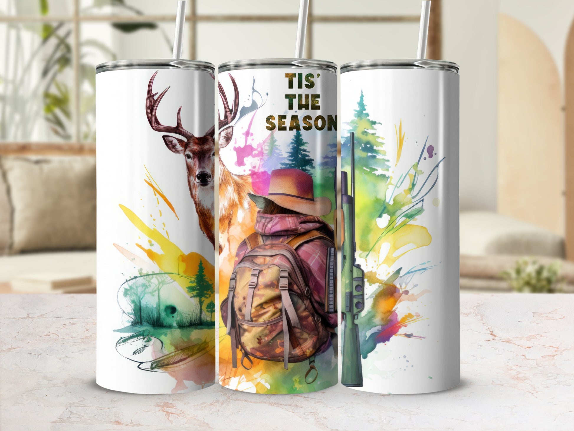 Deer and hunter watercolor design on a set of three tumblers.