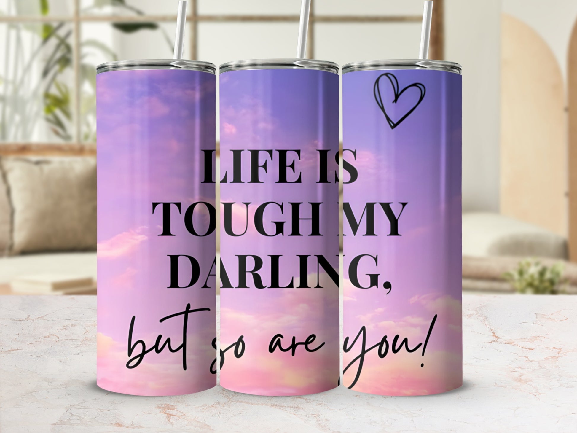 Purple and pink gradient tumbler with text "Life is tough my darling, but so are you!"