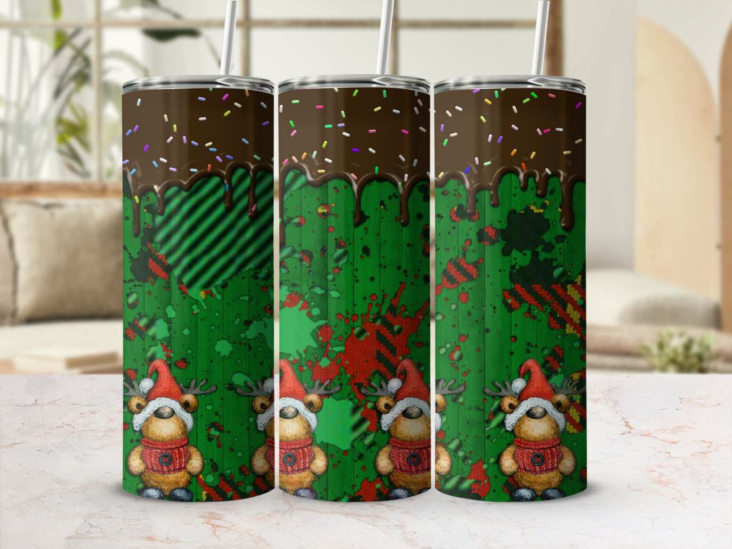 Three tumblers with chocolate drizzle, reindeer, and green plaid background.