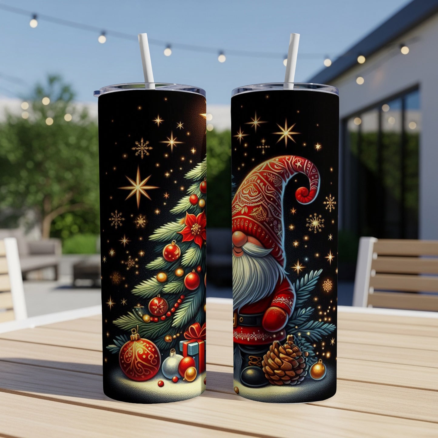 Christmas gnome and tree design on two black tumblers with straws.