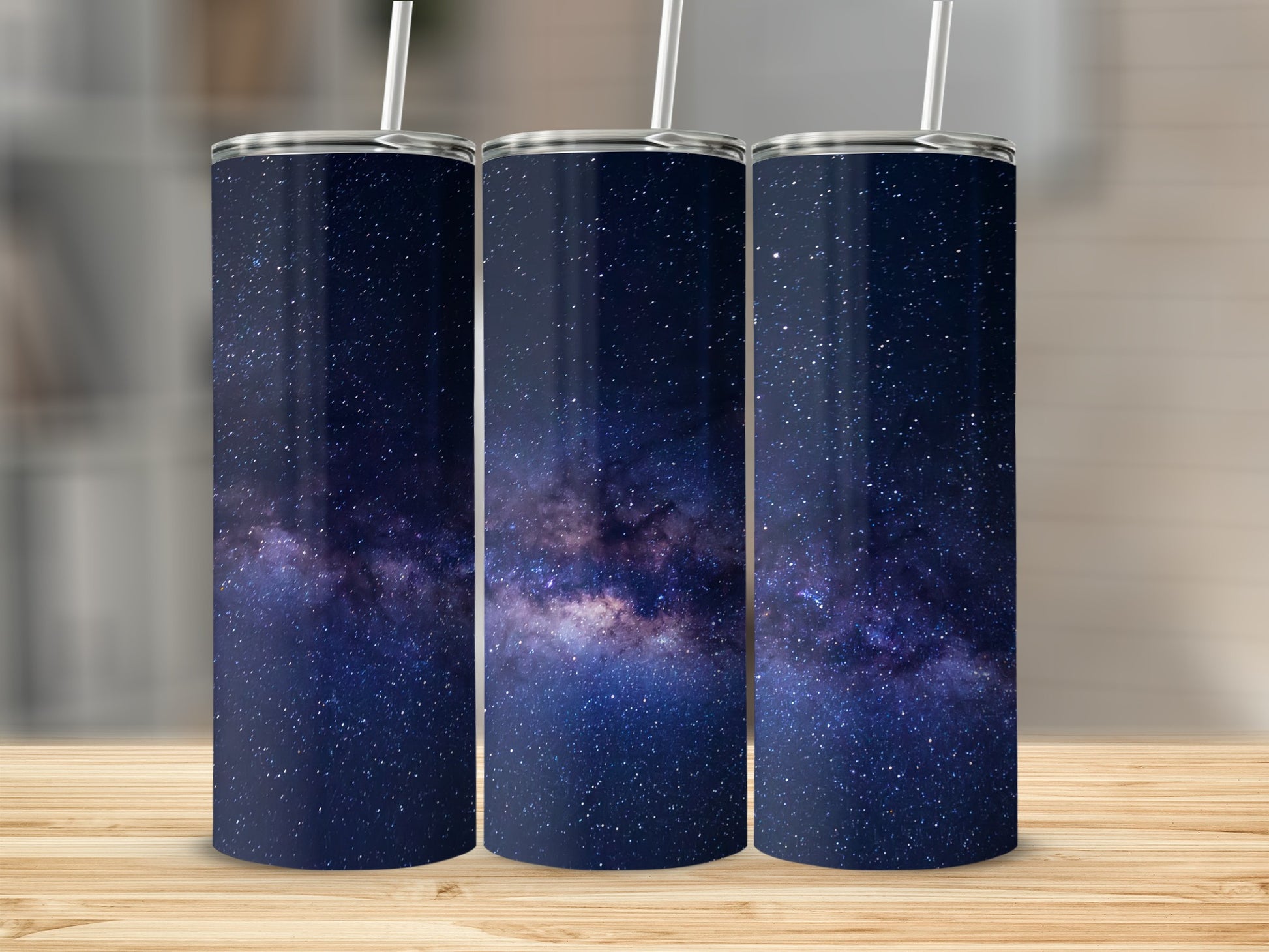 Three skinny tumblers with a starry night sky Milky Way galaxy design.