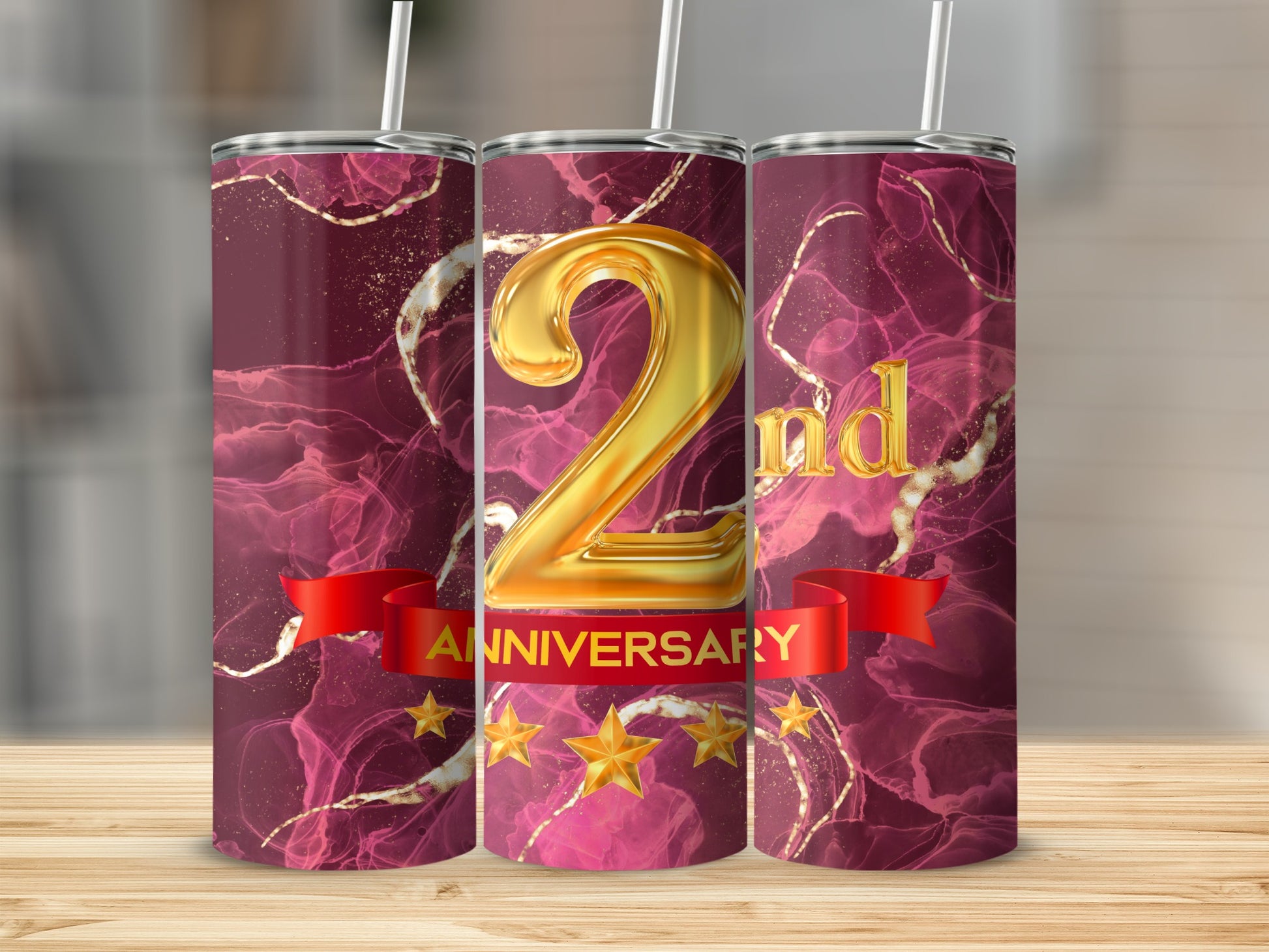 Maroon tumbler with 2nd anniversary text and gold stars.