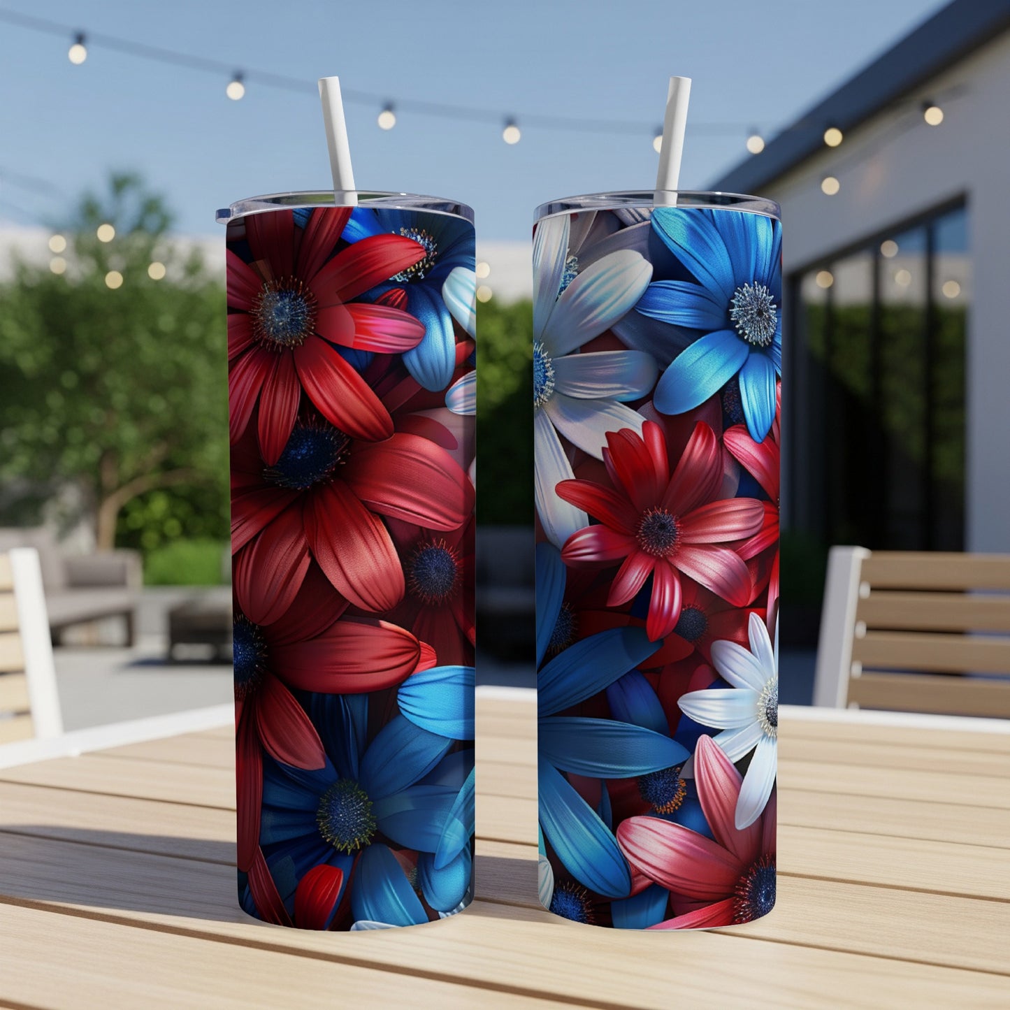 Two tumblers with red, white, and blue floral patterns on a table.
