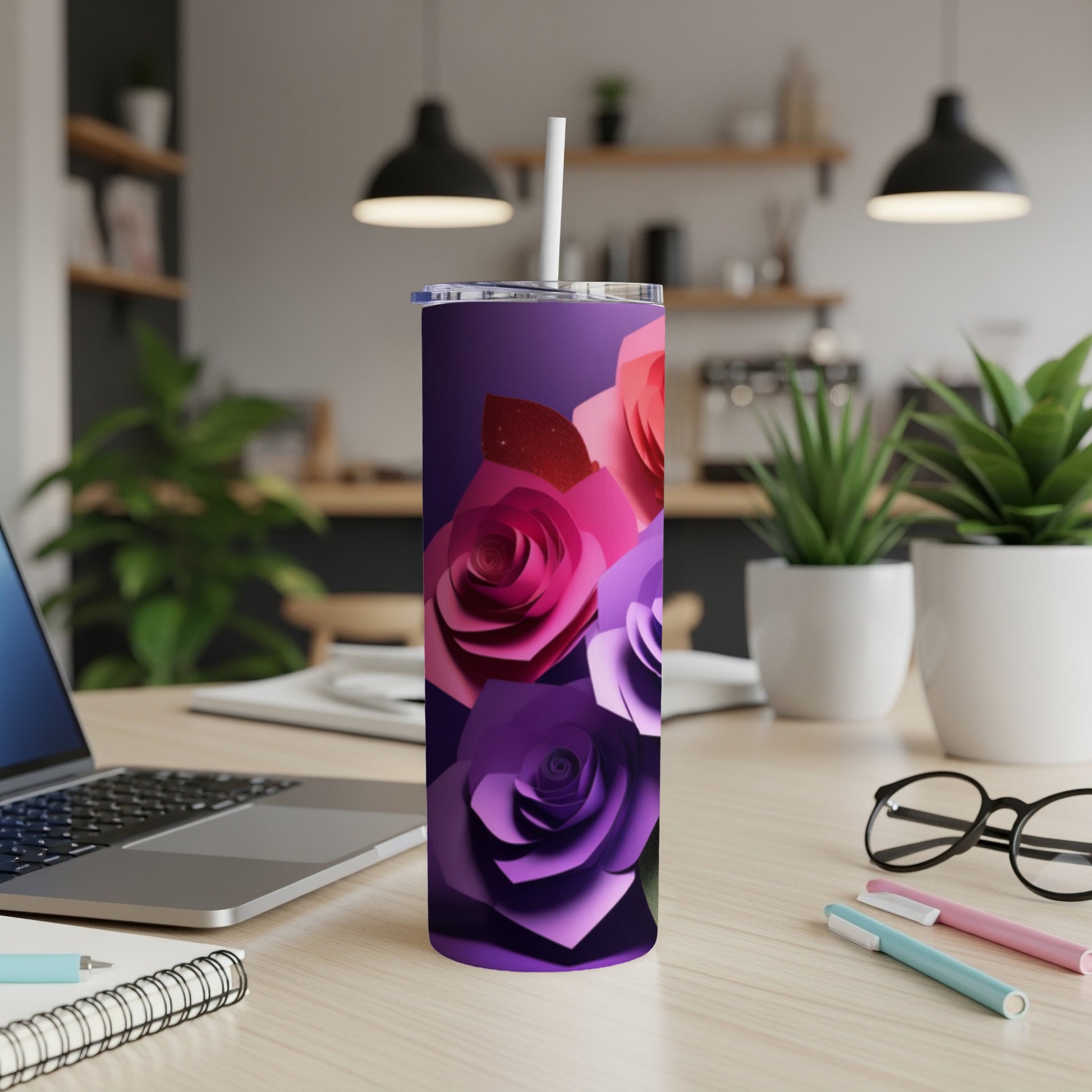 Purple tumbler with a floral rose design, white straw.