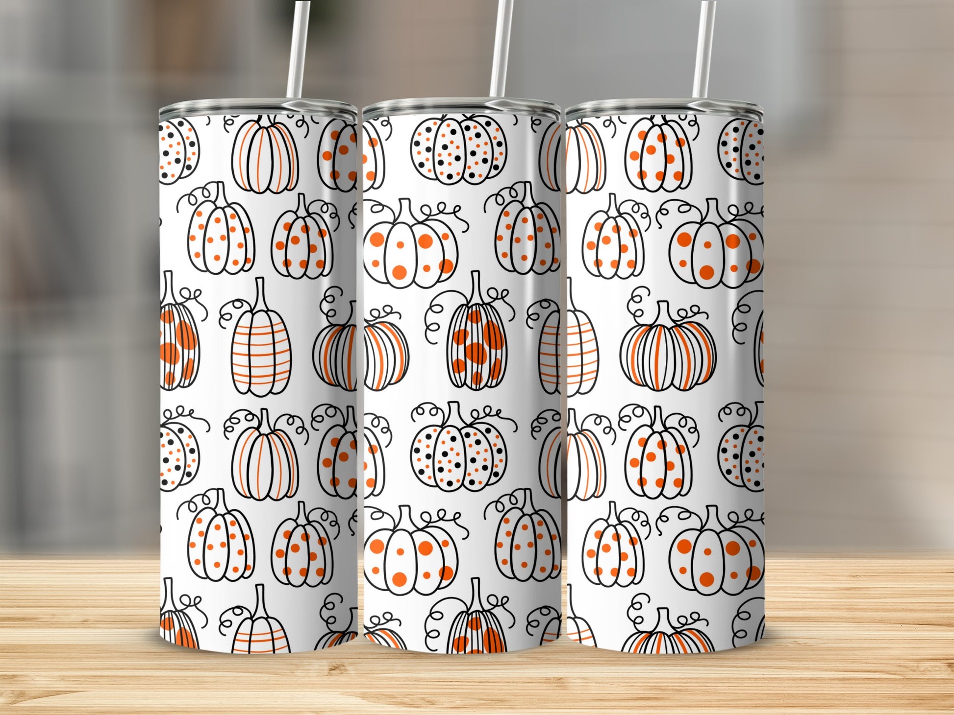Seamless pattern of hand-drawn pumpkins with stripes and polka dots on white background.