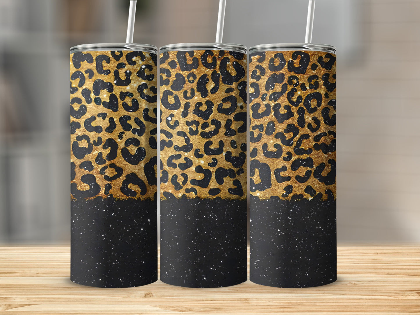 Three tumblers with black and gold leopard print pattern.
