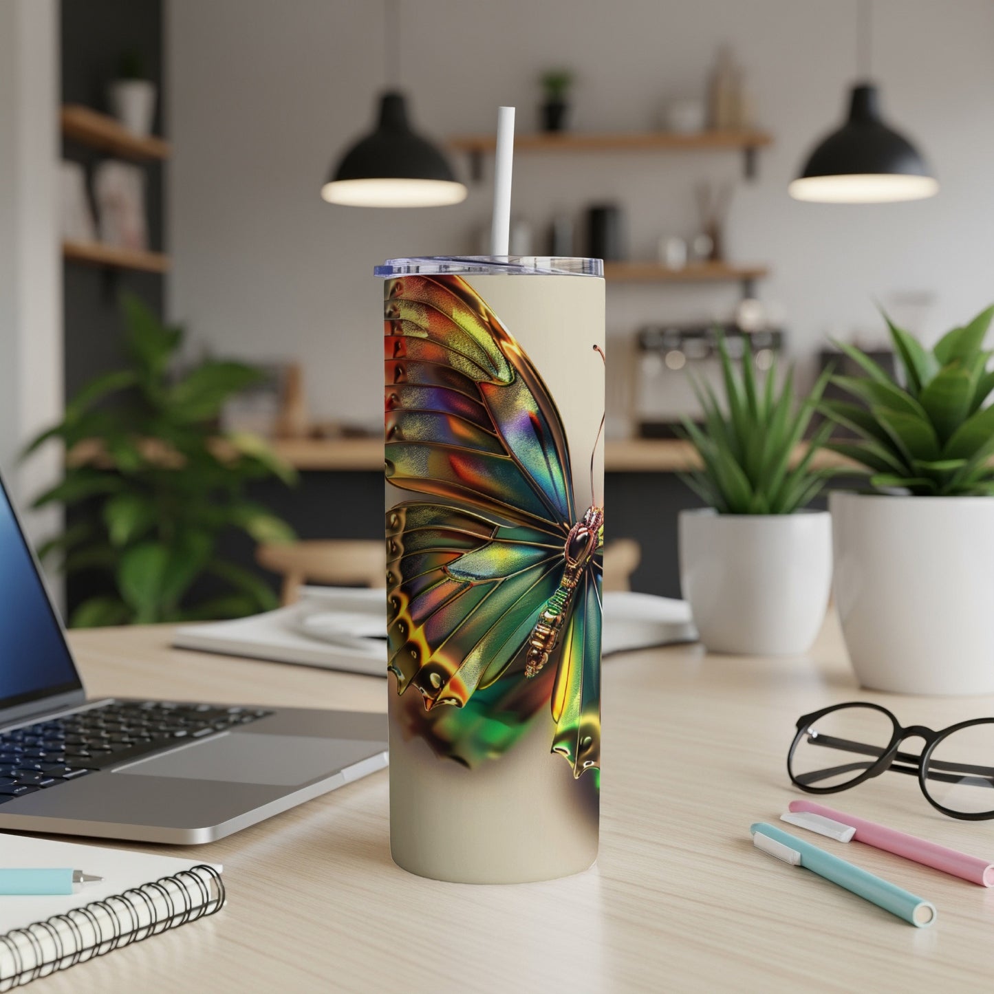 Tall tumbler with a vibrant, colorful butterfly wing design.
