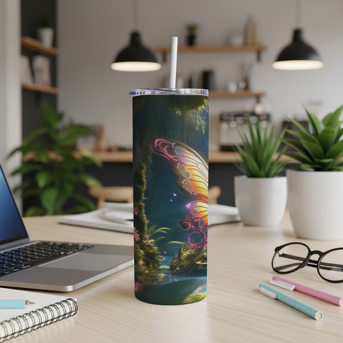 Fairy-themed tumbler with butterfly wings and glowing floral accents on a desk.