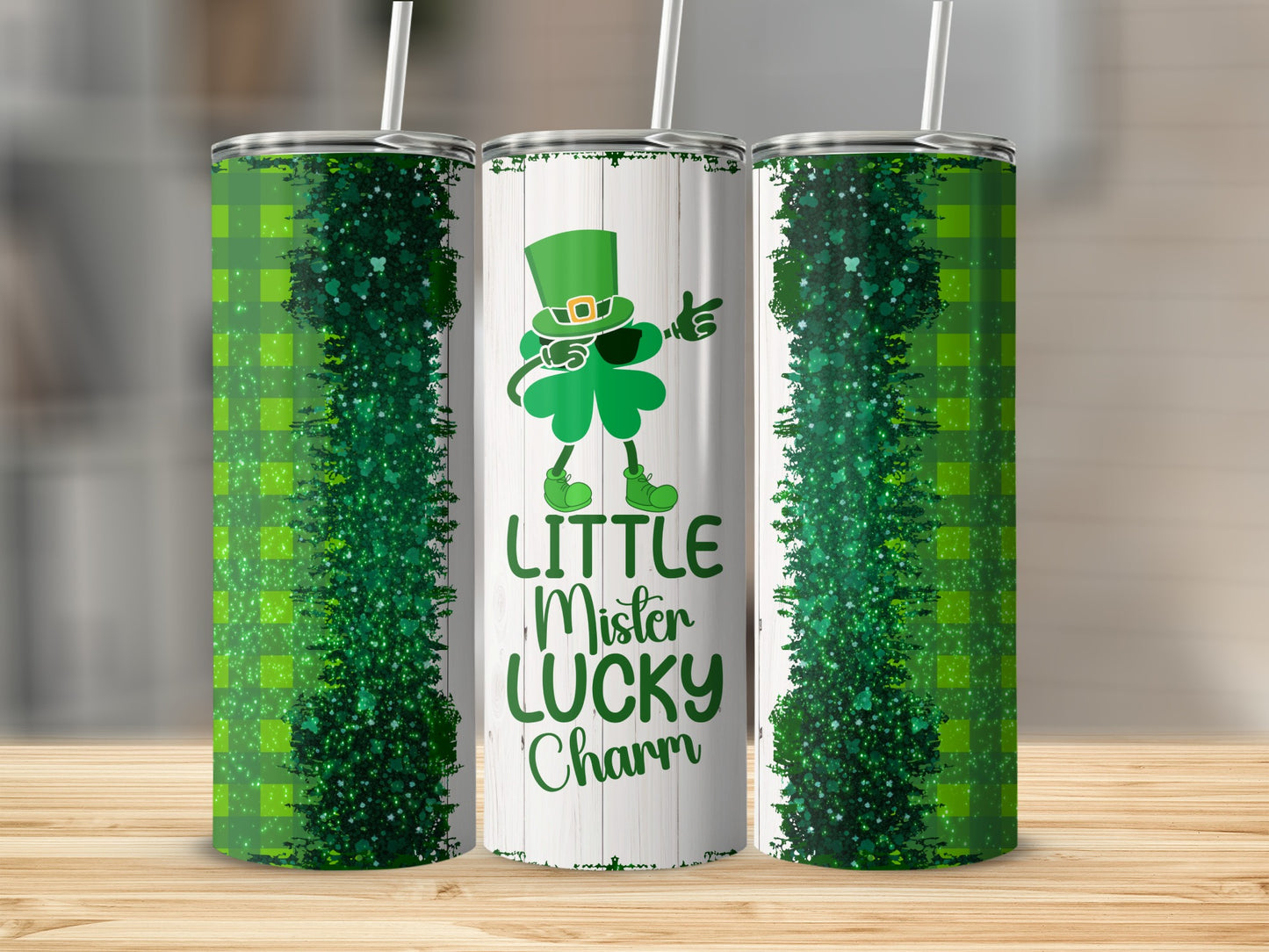 Green plaid and glittery St. Patrick's Day tumbler with "Little Mister Lucky Charm" text.