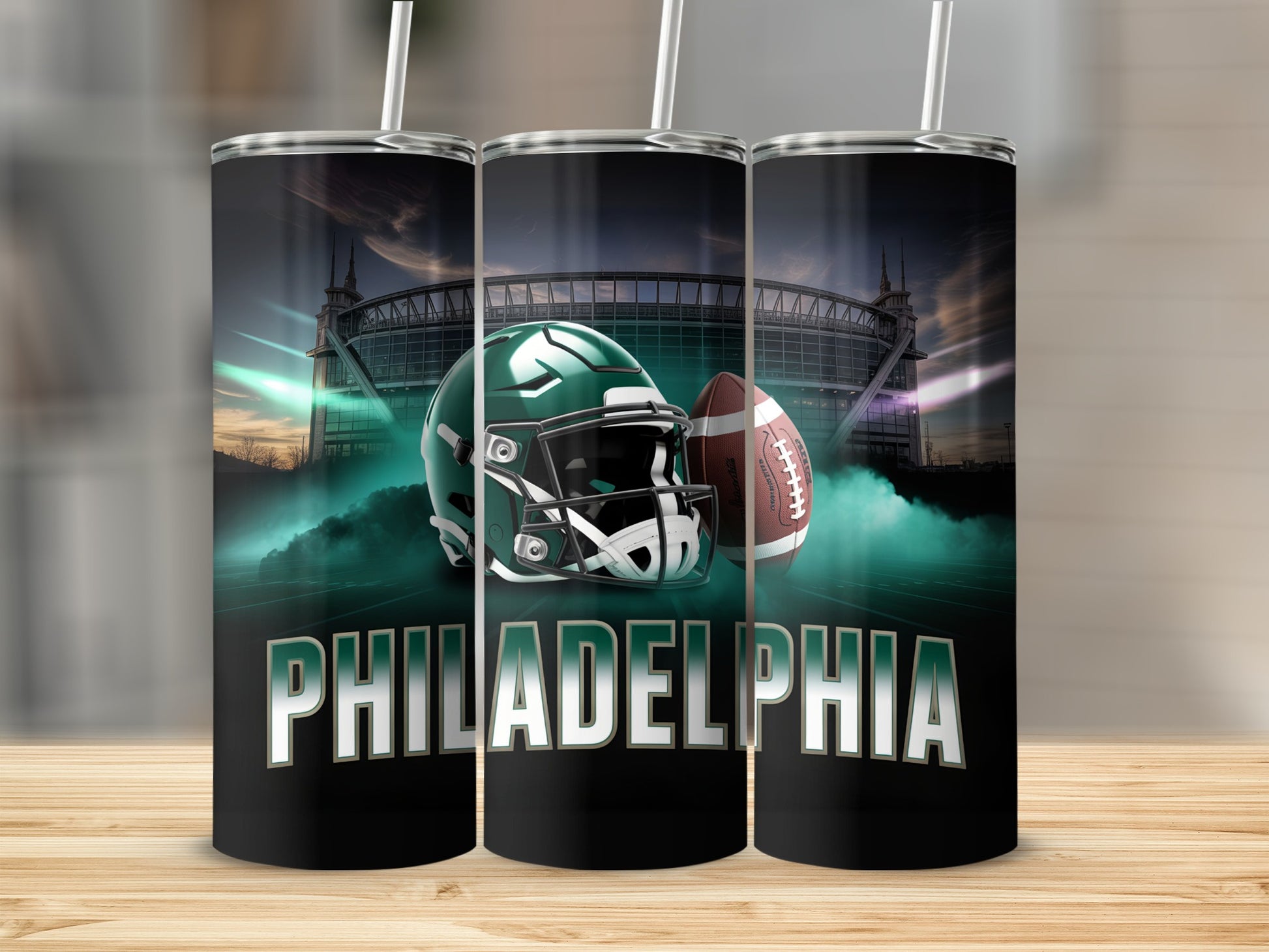 Tumbler with Philadelphia Eagles helmet, football, and stadium graphic.