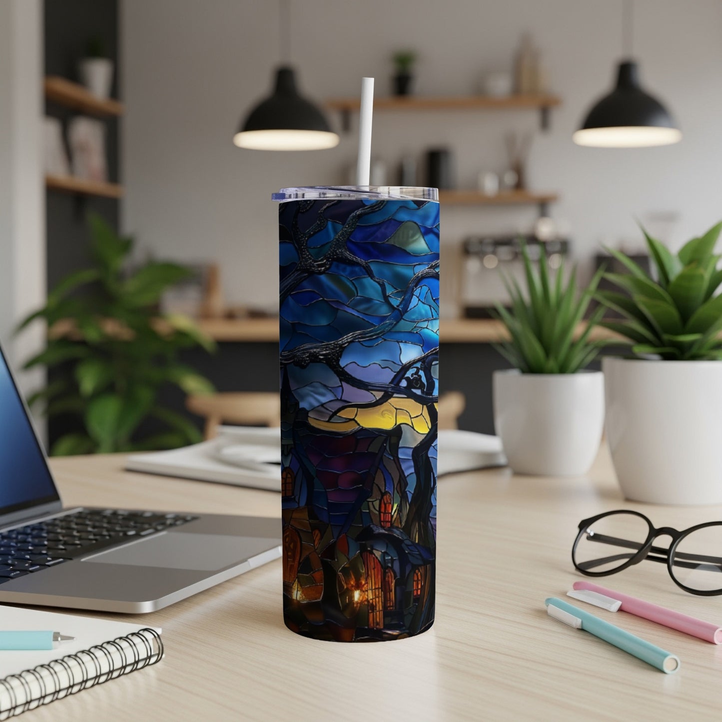 Tall tumbler with a stained glass design of a spooky house.