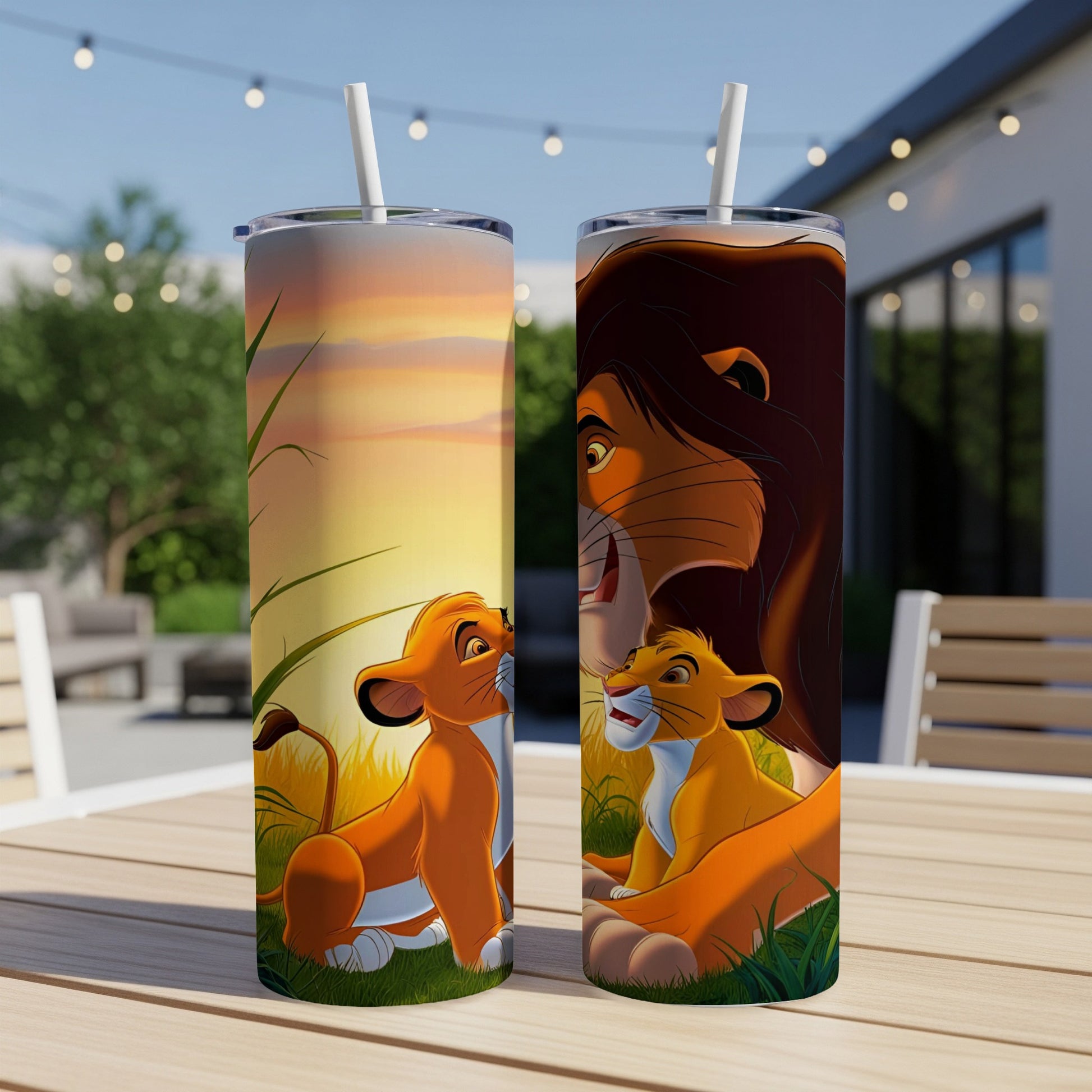 Simba and Mufasa from The Lion King sitting in grass at sunset.