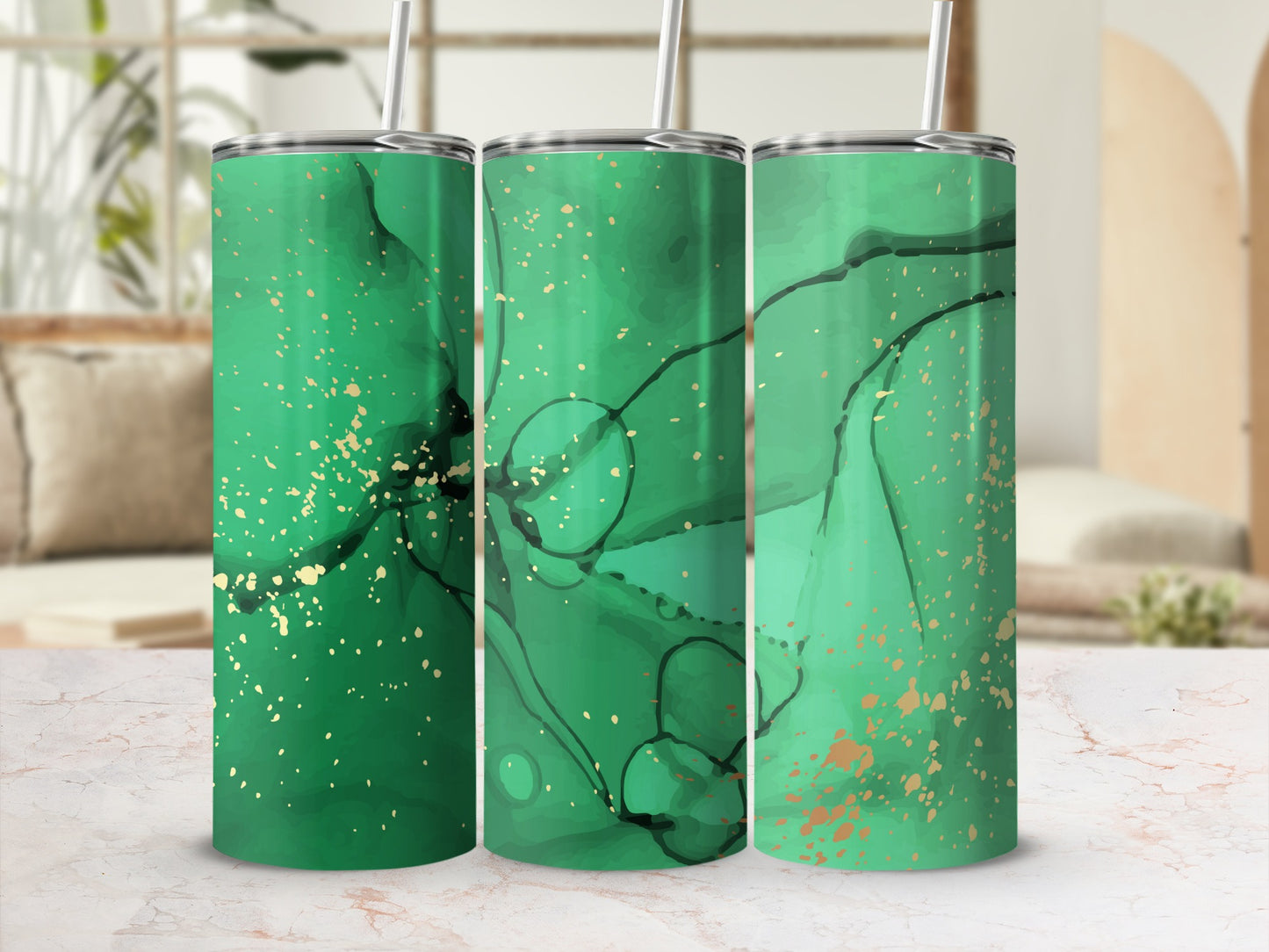 Three green abstract watercolor tumblers with gold speckles and straws.