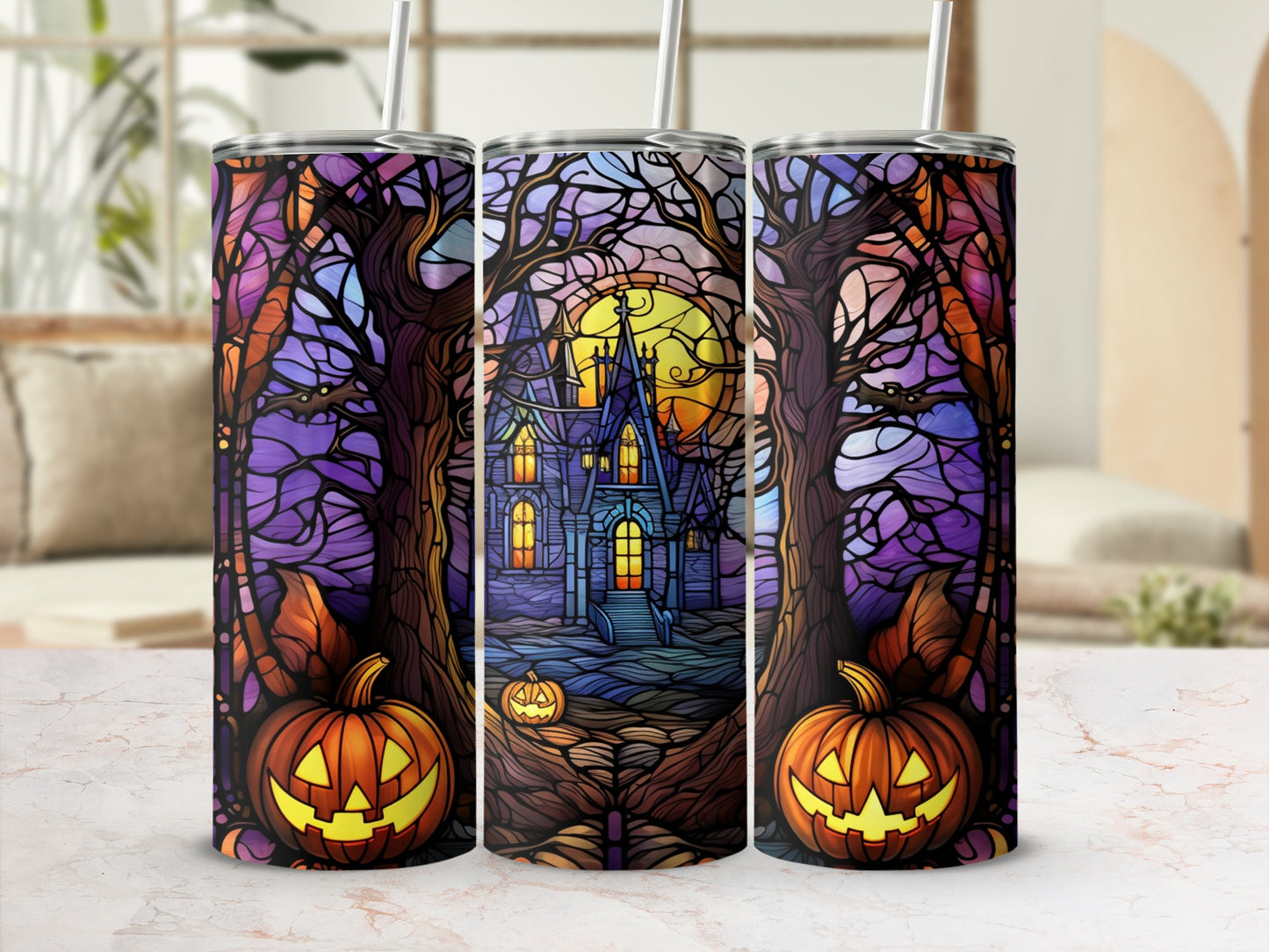 Halloween tumbler with spooky castle, pumpkins, and trees.