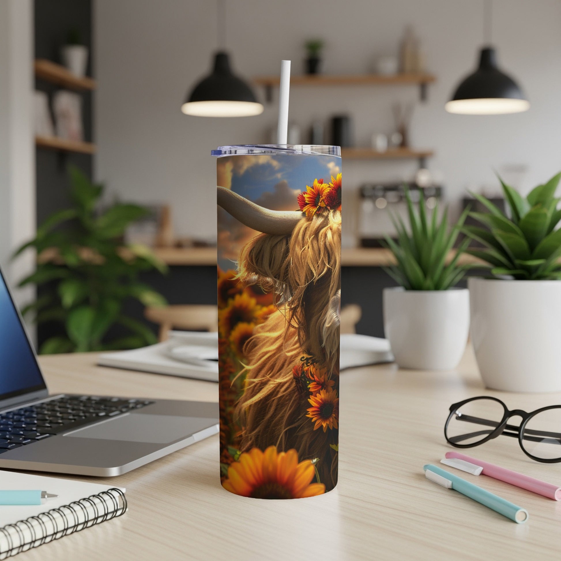 Highland cow with sunflowers on a tumbler.