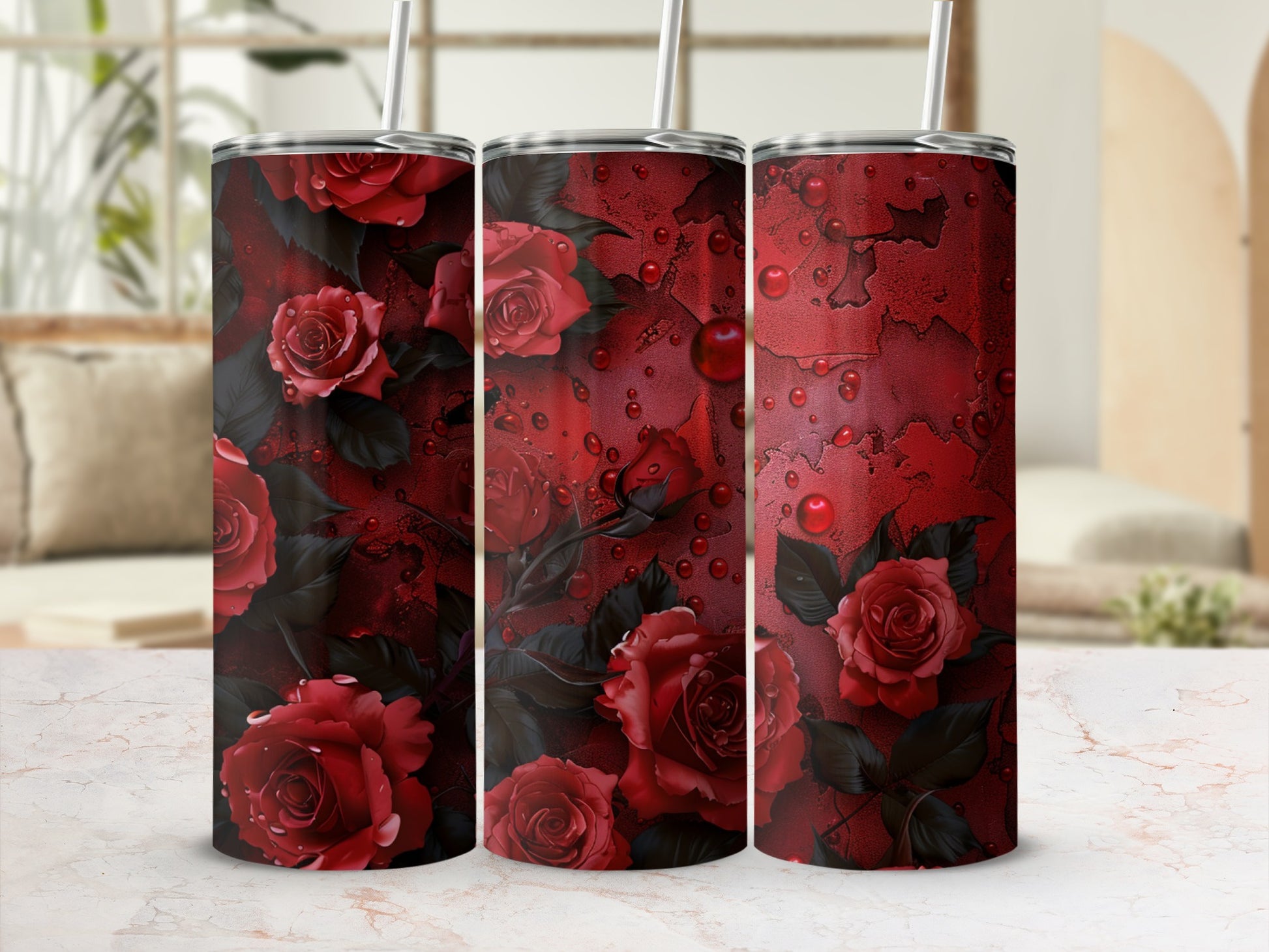 Three tumblers with red roses and water droplets on a textured background.