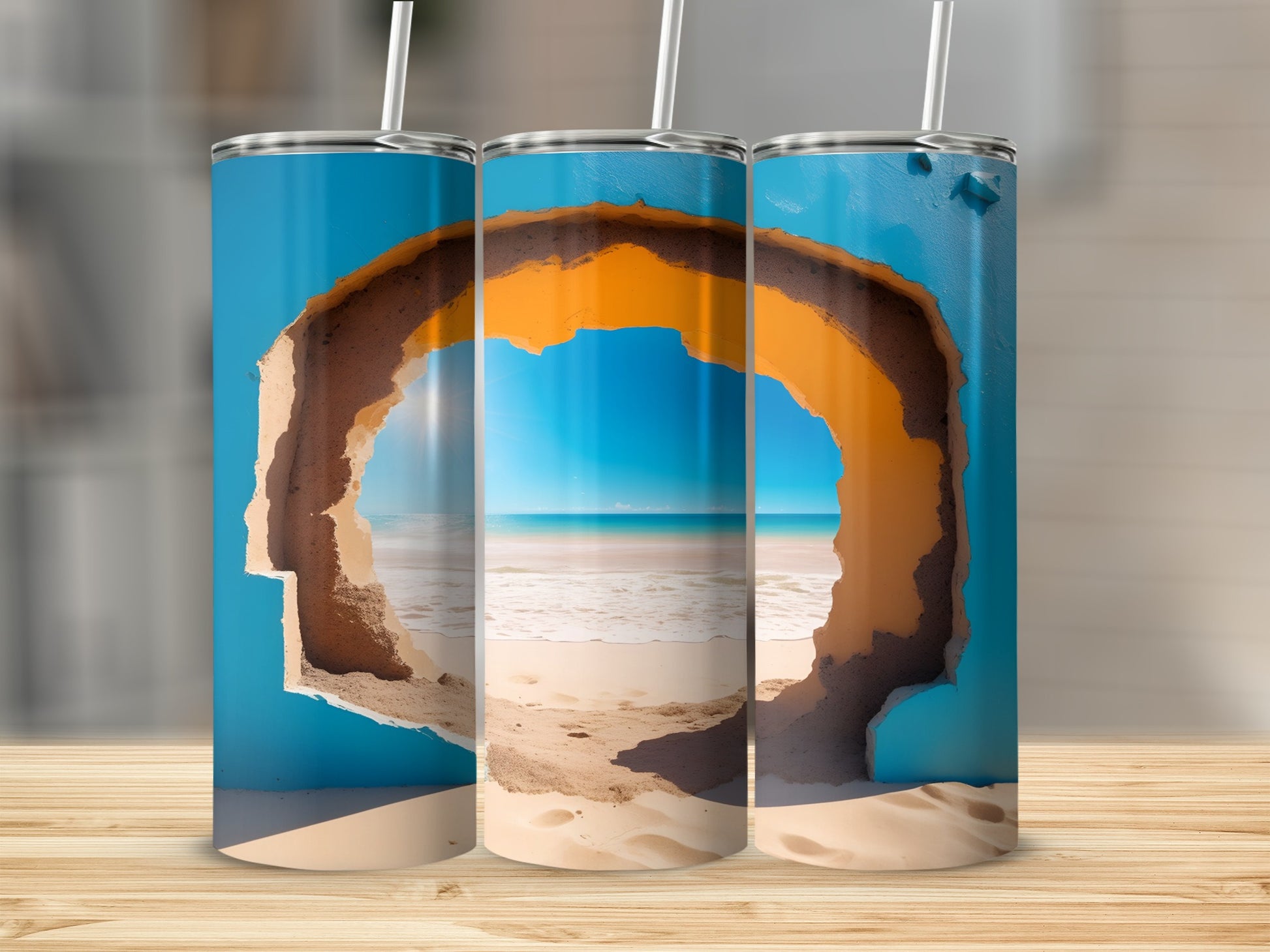Three 20 oz tumblers with a beach scene visible through a hole.