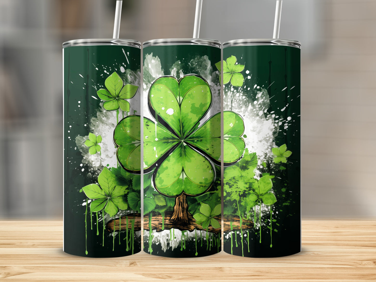 Green shamrock tree design on a set of three tumblers.
