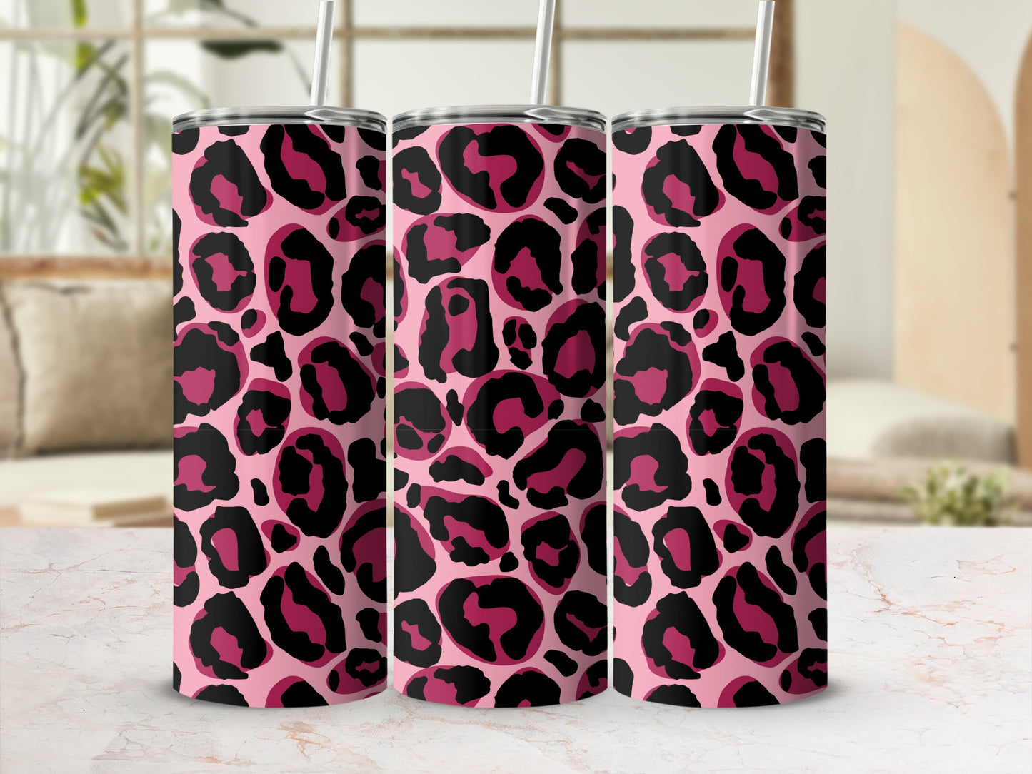 Three pink tumblers with a black and hot pink leopard print pattern.