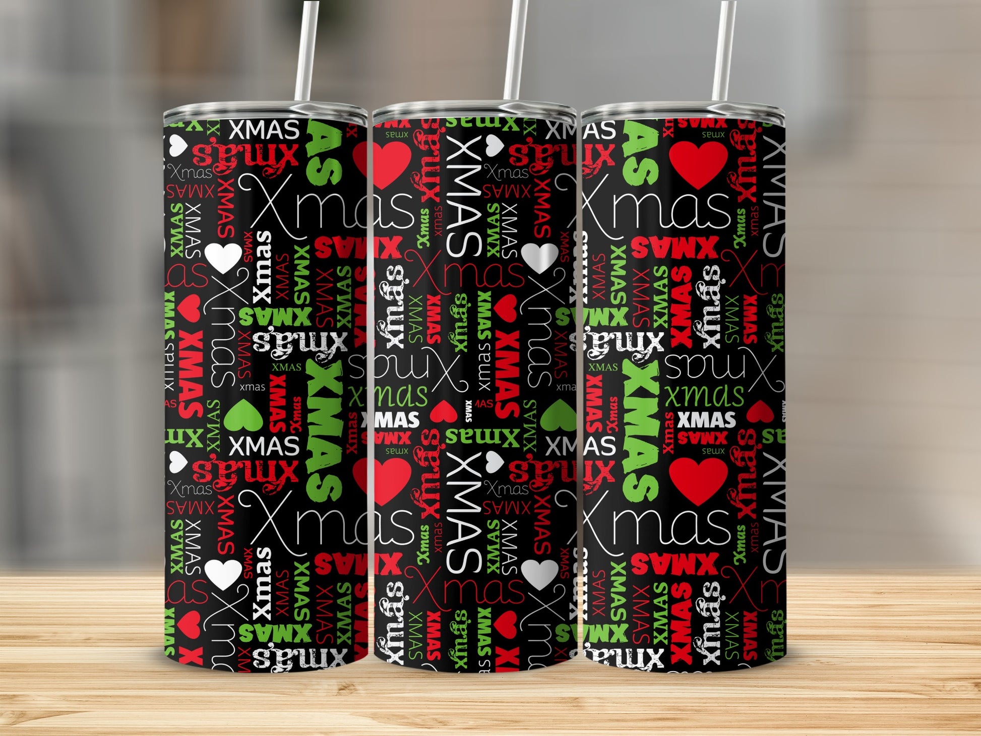 Pattern of red and green "XMAS" text with hearts on a black tumbler.