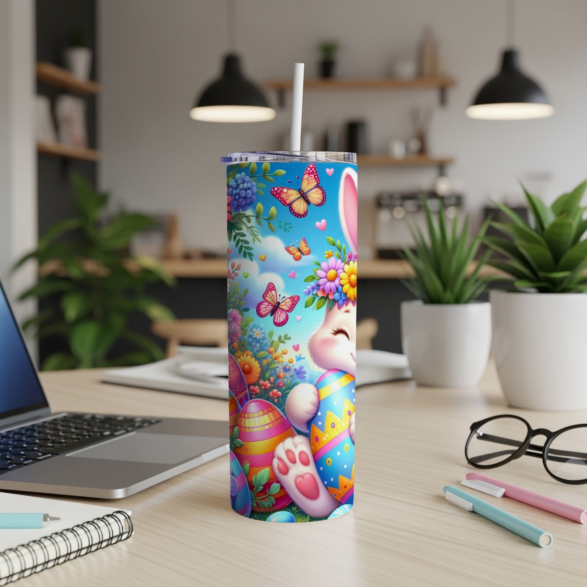 Easter bunny with colorful eggs and butterflies on a skinny tumbler.